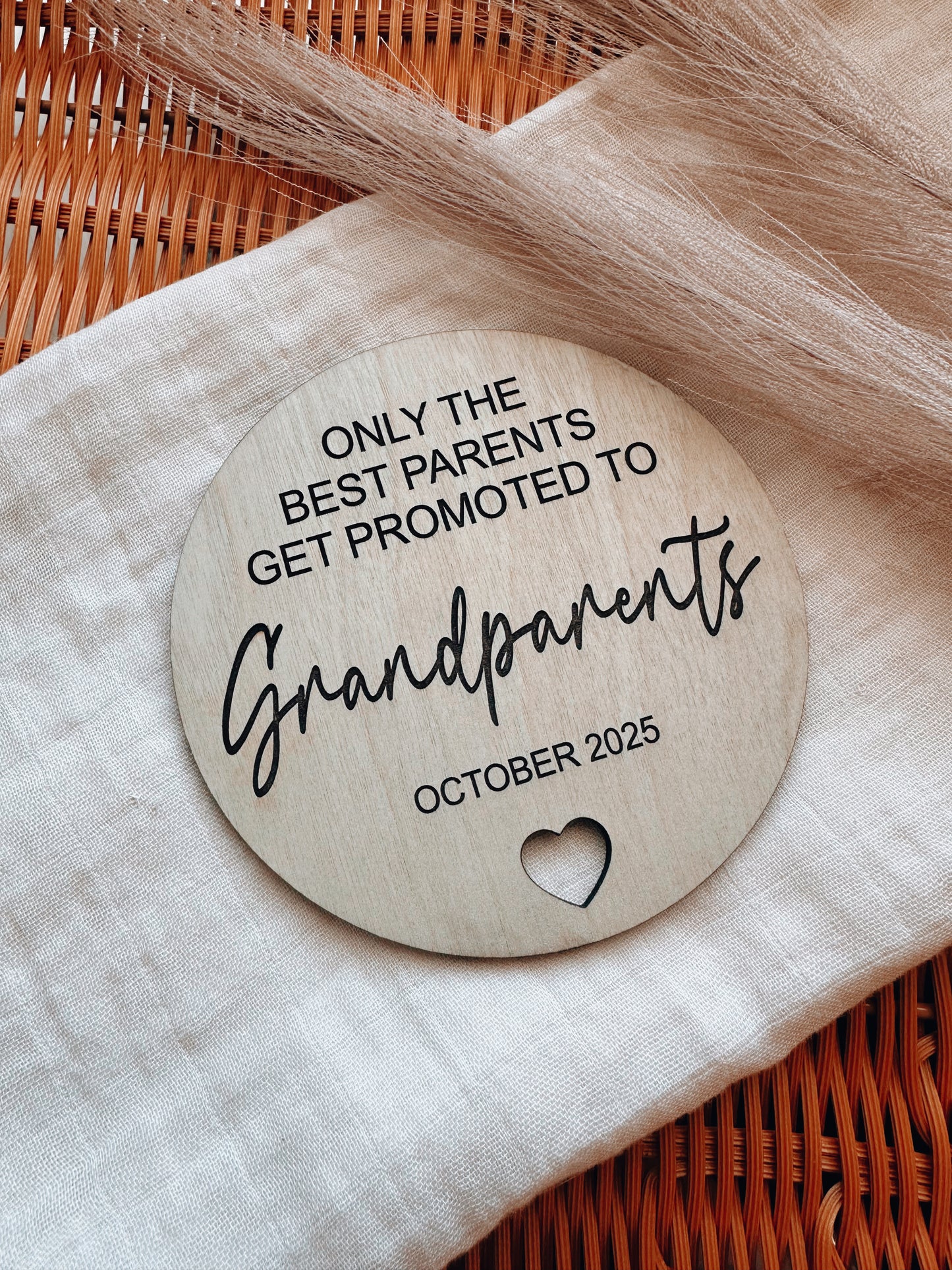 Promoted to Grandparents, pregnancy reveal plaque