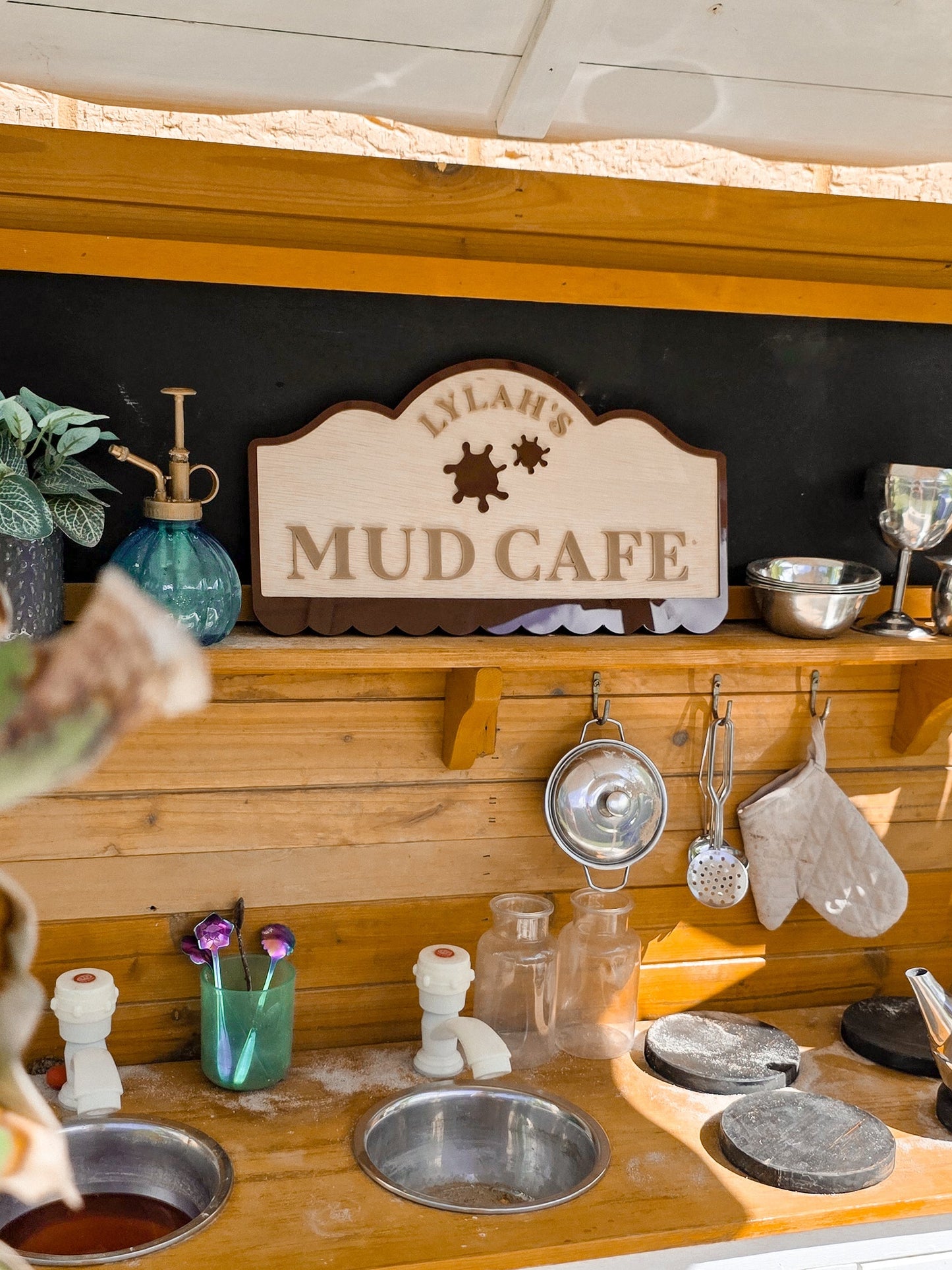 Mud Cafe Boutique Play Space Sign