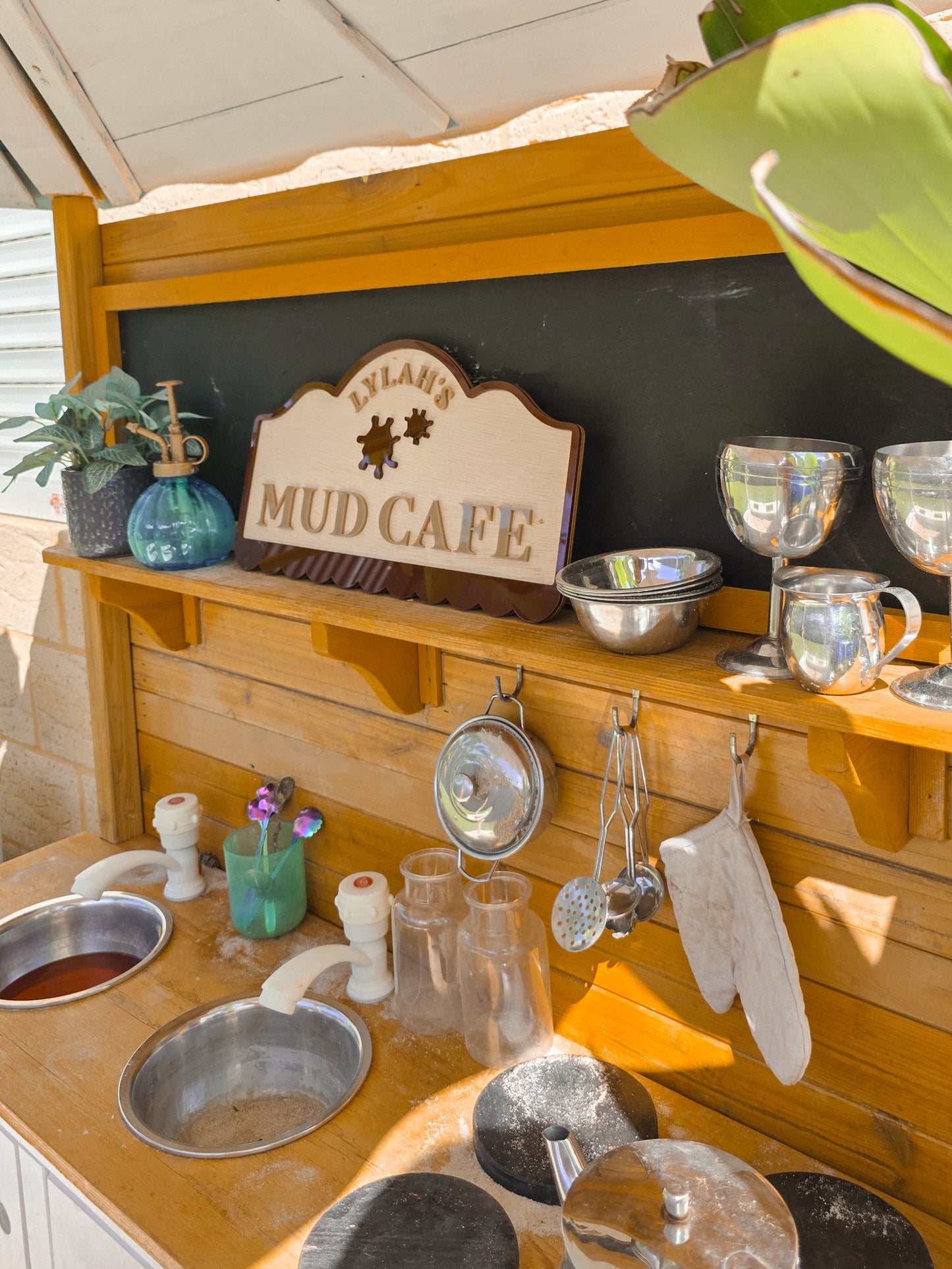 Mud Cafe Boutique Play Space Sign