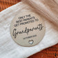 Promoted to Grandparents, pregnancy reveal plaque