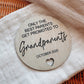 Promoted to Grandparents, pregnancy reveal plaque